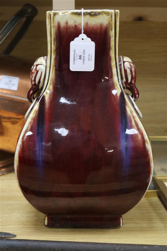 A Chinese sang-de-boeuf glazed hu vase